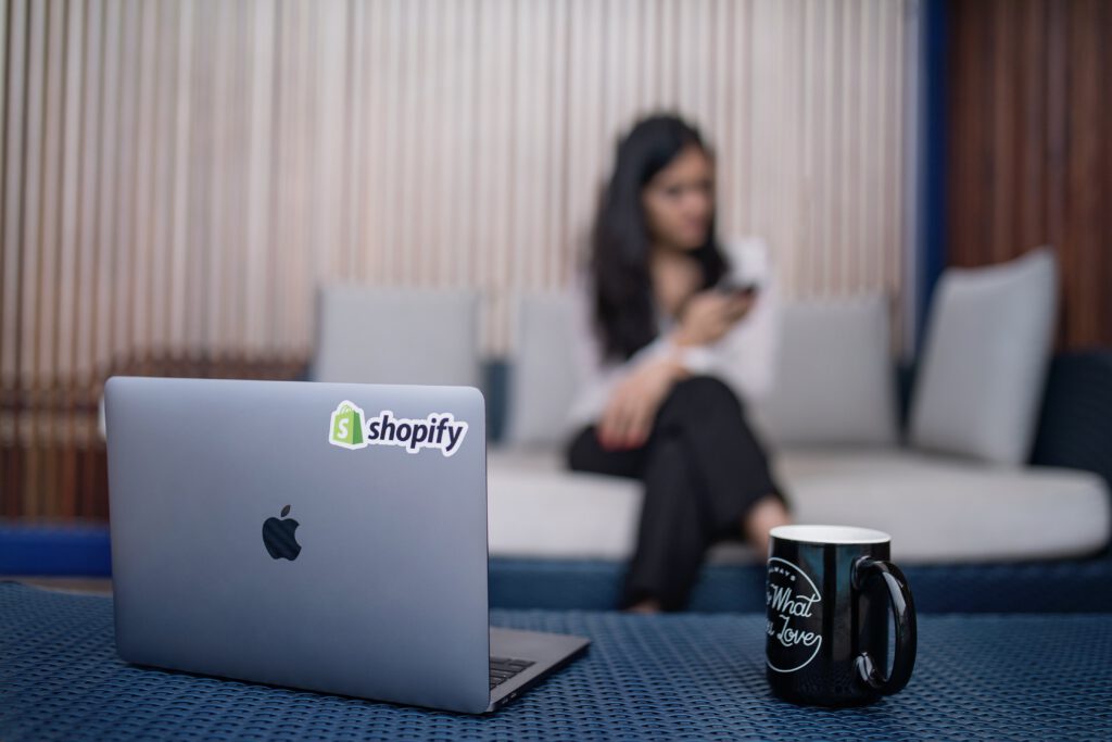 Laptop with Shopify Sticker